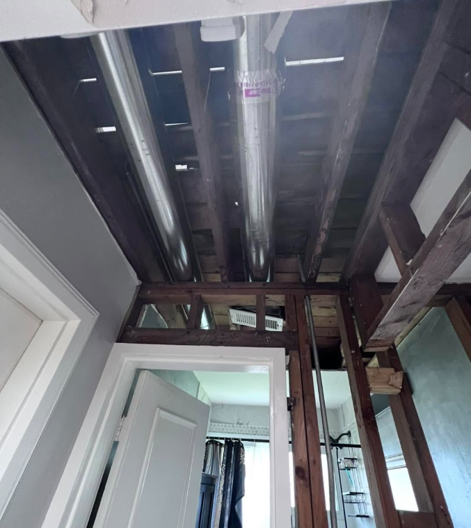 Water traveled two floors — ceiling opened and dried